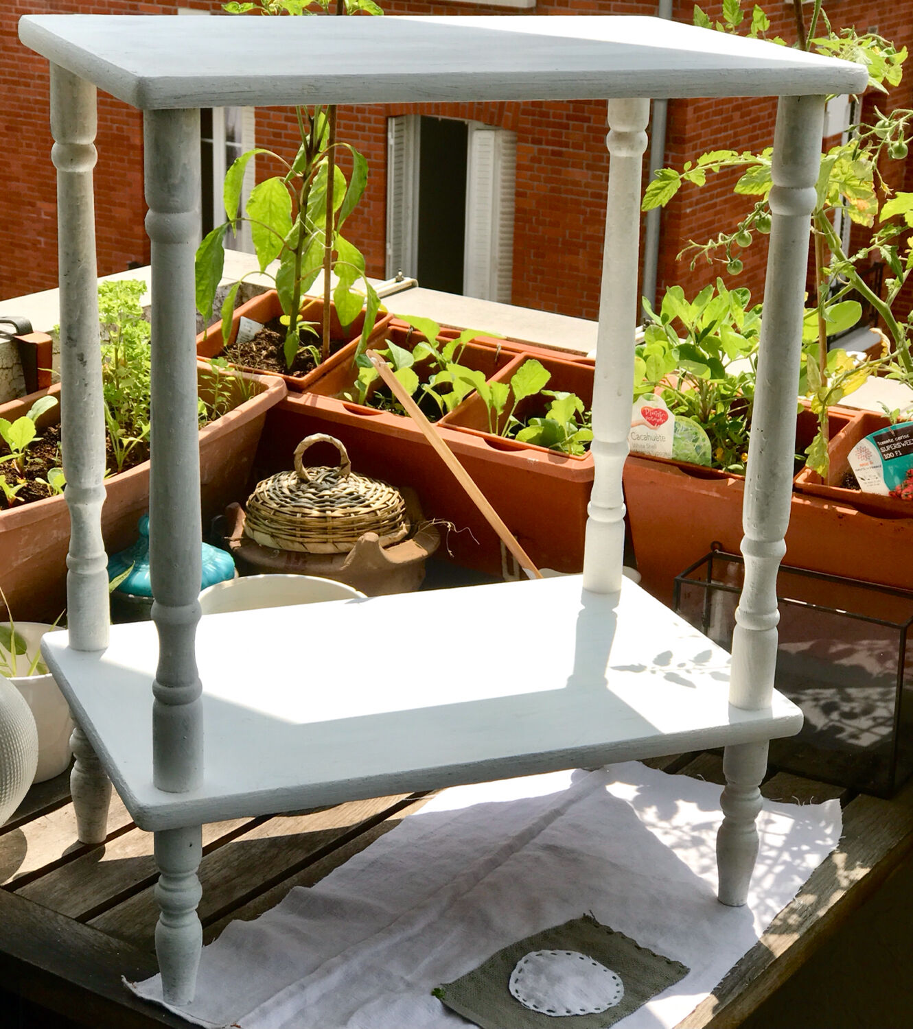 Vintage wooden side table with white patina