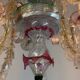 Venetian Rezzonico chandelier in colourless and red Murano glass, circa 1900.