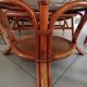 Sofa armchairs and coffee table in vintage rattan of six pieces