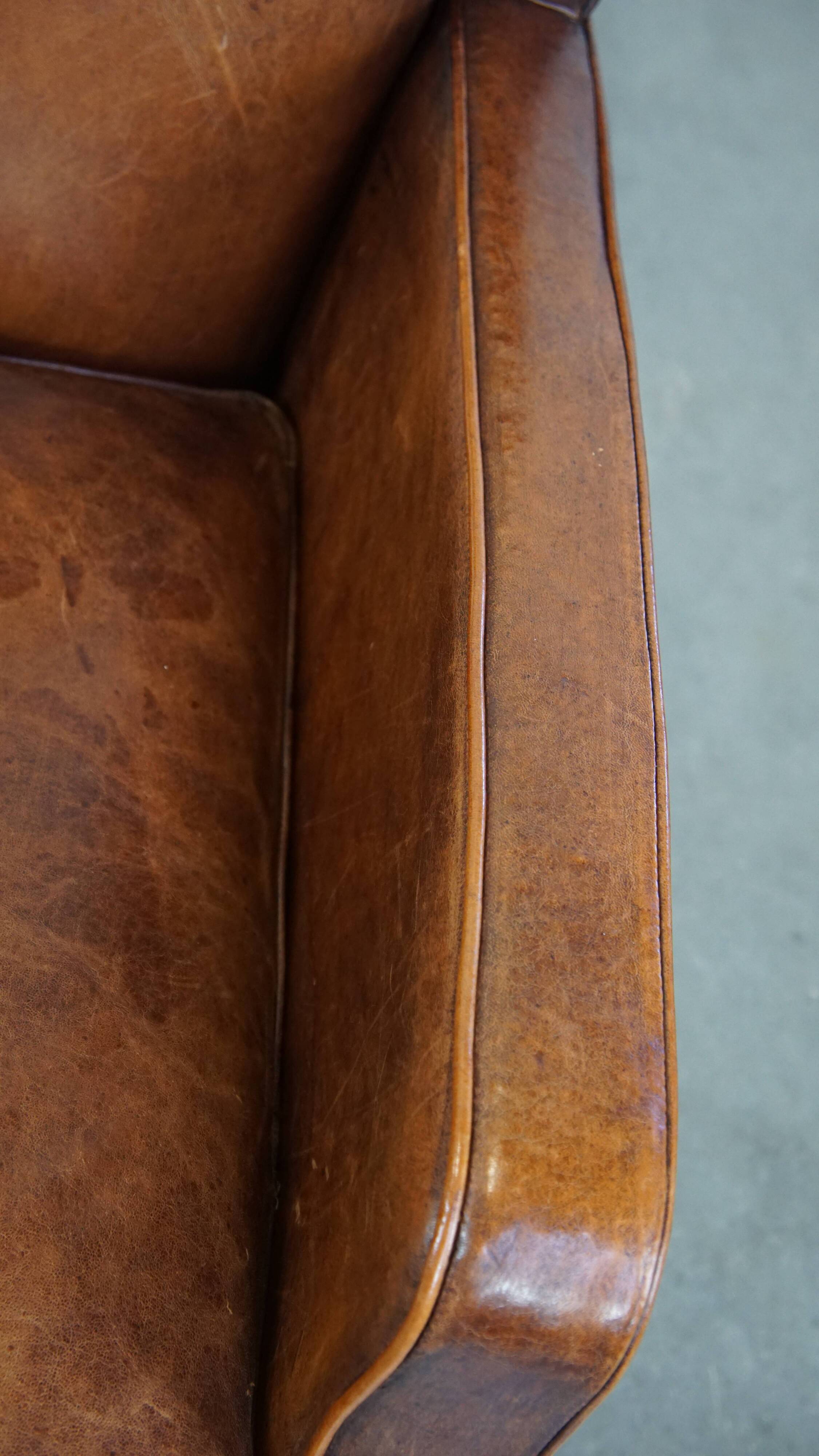 Sheepskin armchair with a refined Art Deco design