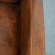 Sheepskin armchair with a refined Art Deco design