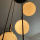 Lustre cascade de globes opaline des années 70