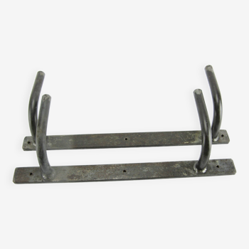 Pair of metal hooks, industrial workshop