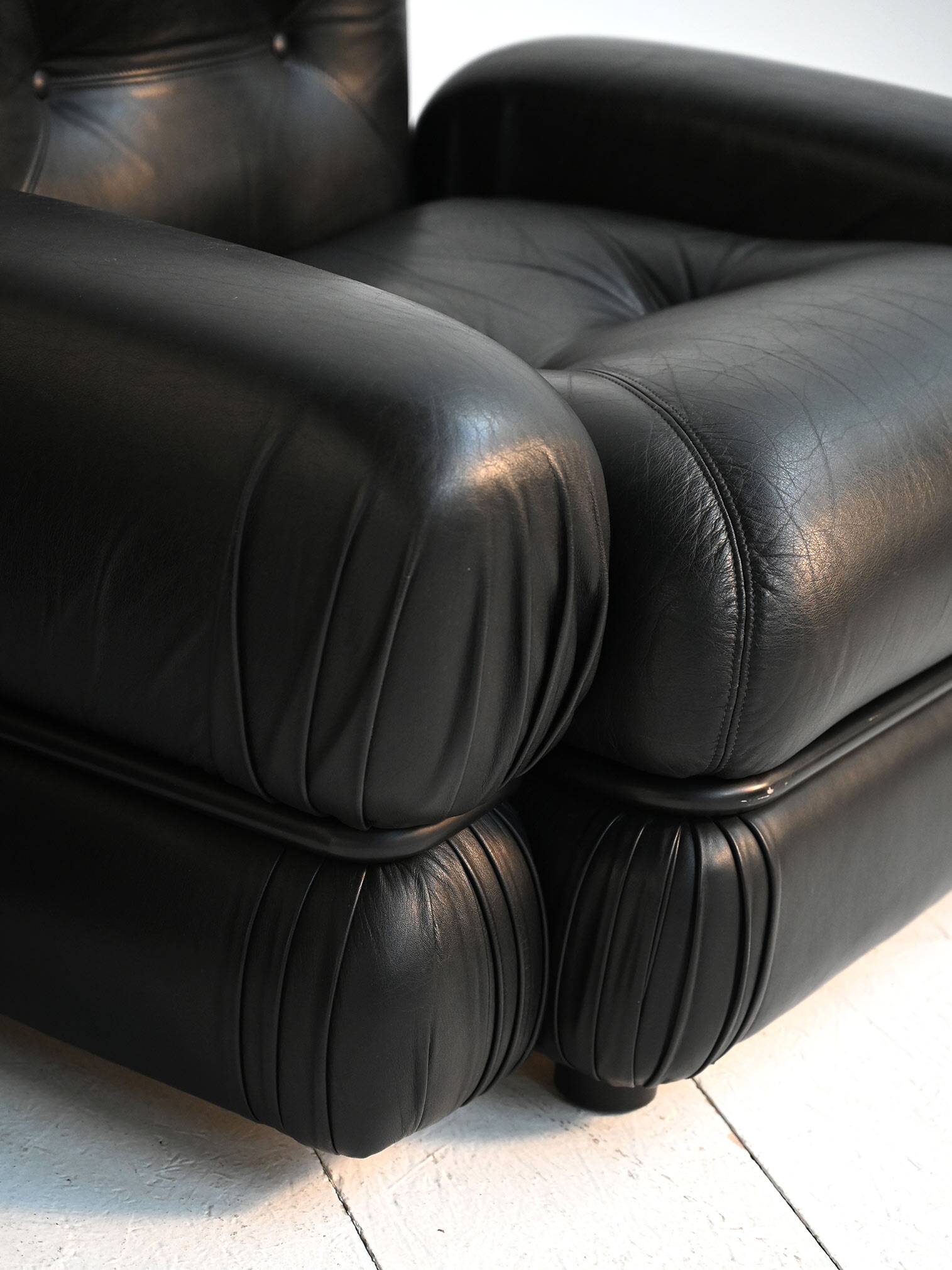 Black leather and tubular steel armchairs, 1970s