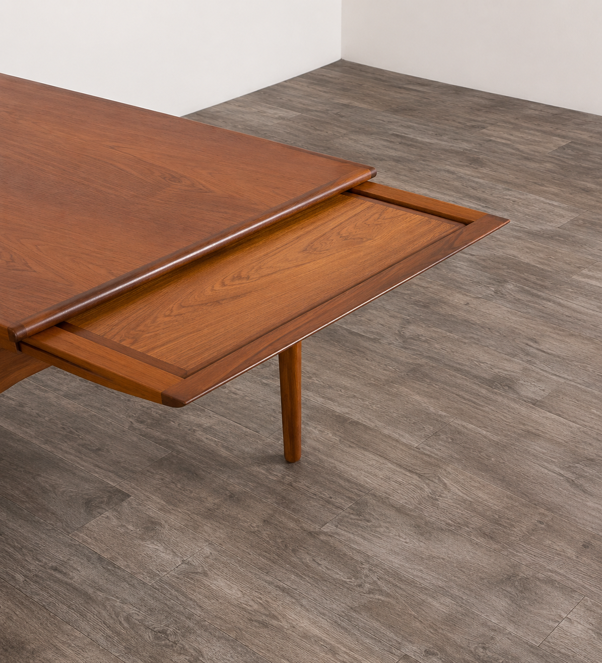 Table à manger en teck avec extension par Johannes Andersen, pour Uldum Møbelfabrik, Danemark, 1960.