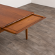 Table à manger en teck avec extension par Johannes Andersen, pour Uldum Møbelfabrik, Danemark, 1960.