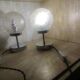 Duo of textured globe lamps with a large play of light.