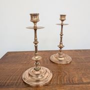 Pair of antique turned rose brass candlesticks (24 cm)