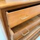 Vintage chest of drawers with tapered legs