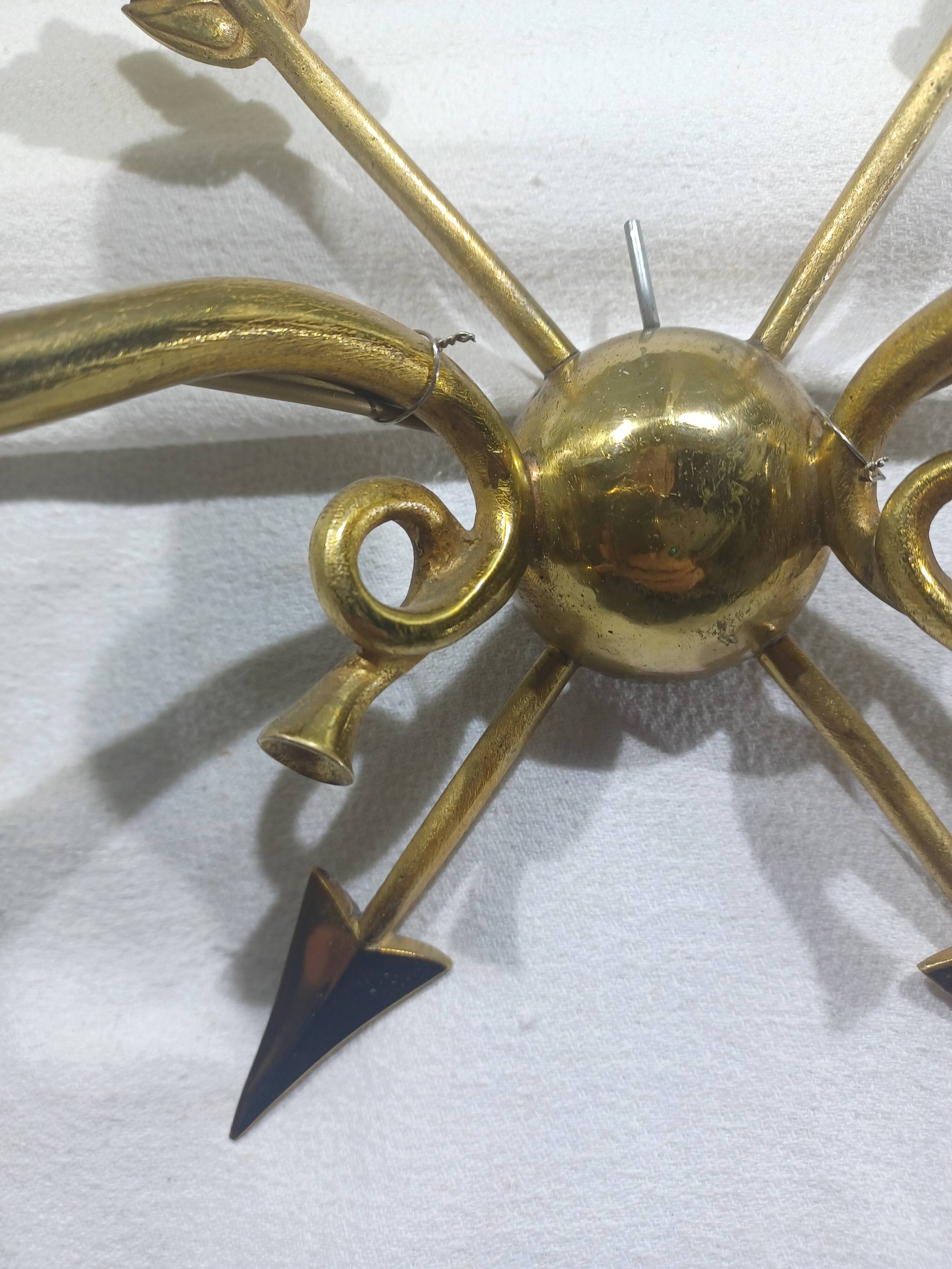 Empire style arrow wall light