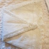 Round hand-embroidered linen tablecloth