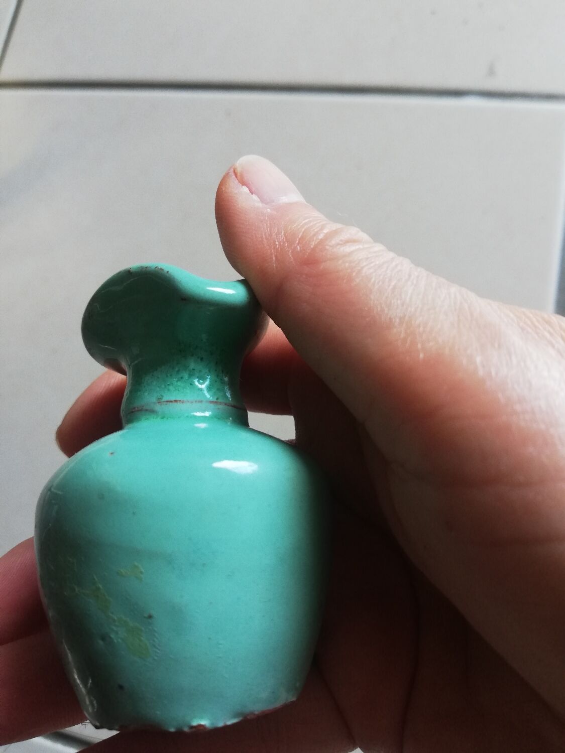 Very small turquoise soliflore in the shape of a ceramic jug