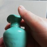 Very small turquoise soliflore in the shape of a ceramic jug
