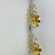 Pair of Hollywood Regency wall lights with glass and gold metal pendants Mathias