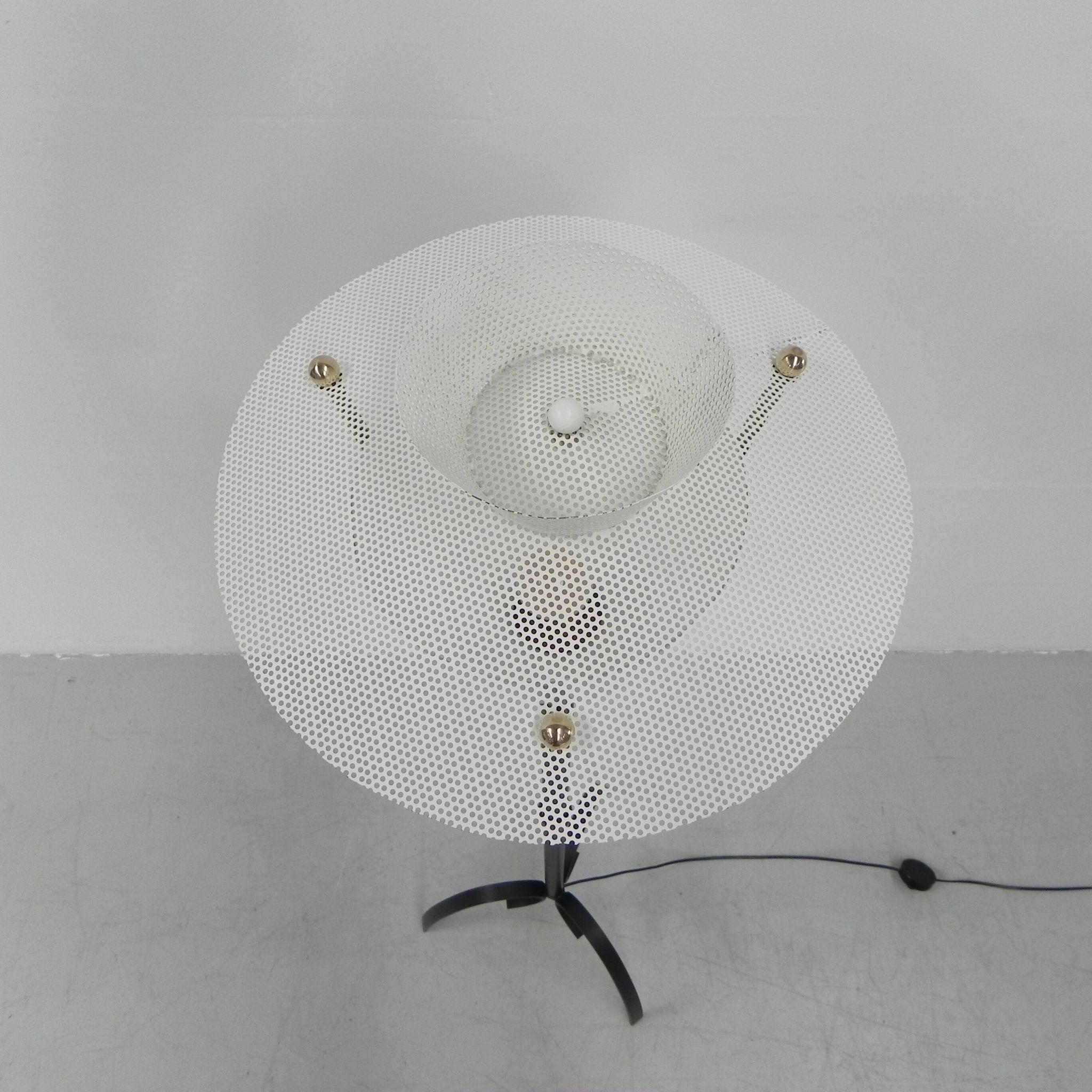 Standing vintage lamp with glass shade and perforated steel shade