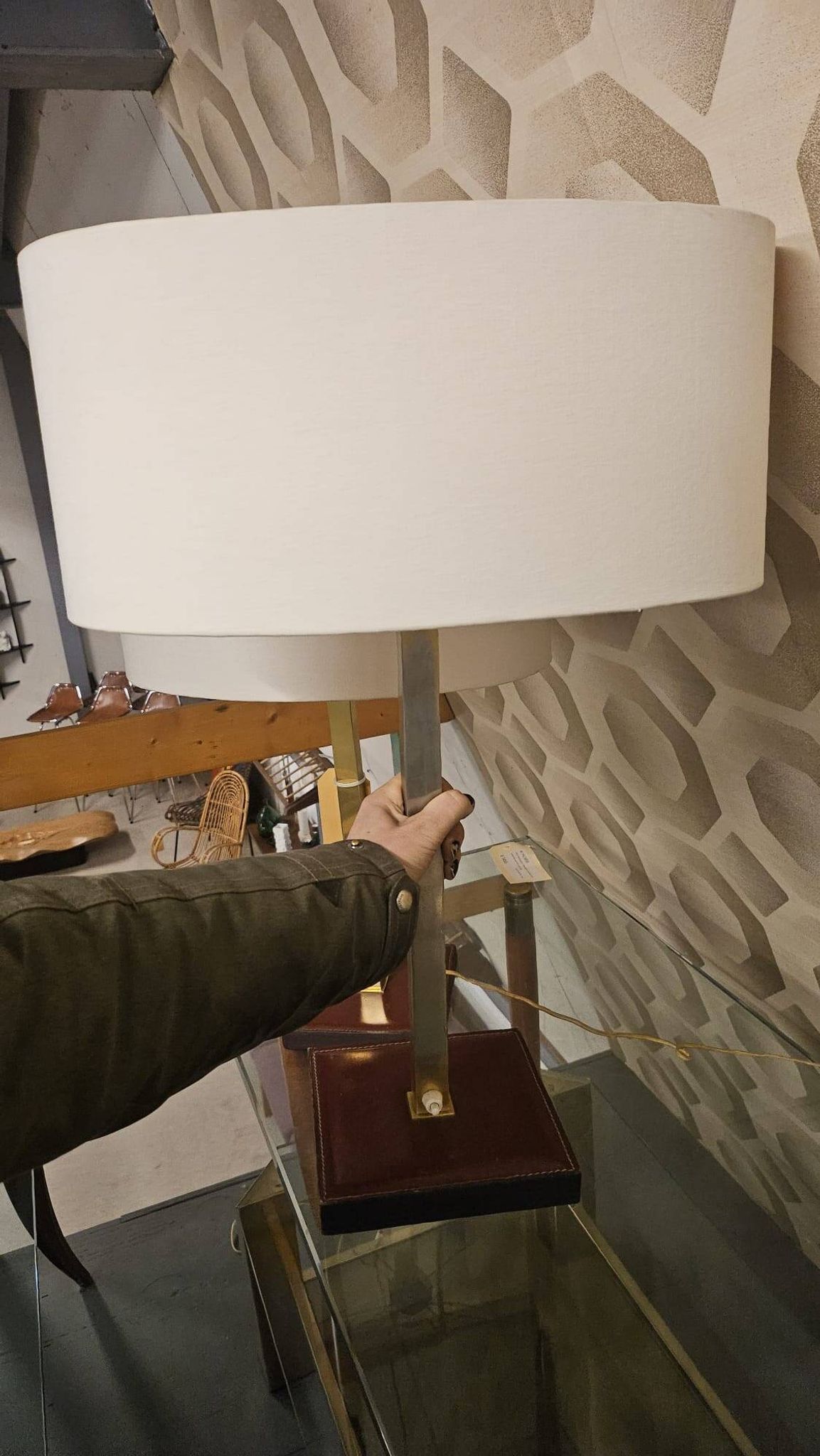 Pair of leather and brass table lamps from the 1960s, originating from Belgium.