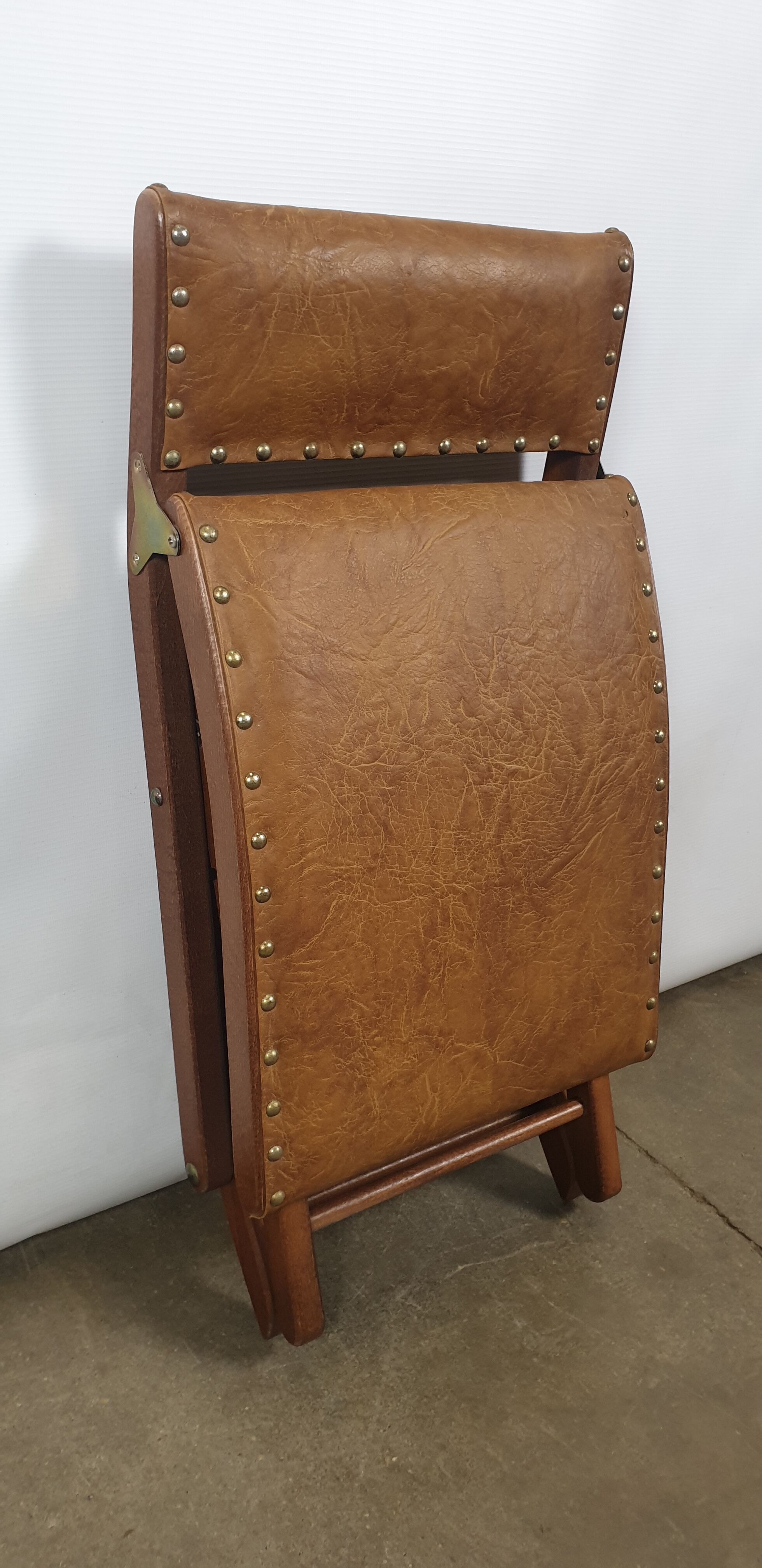 Wooden and leather folding rocking footring