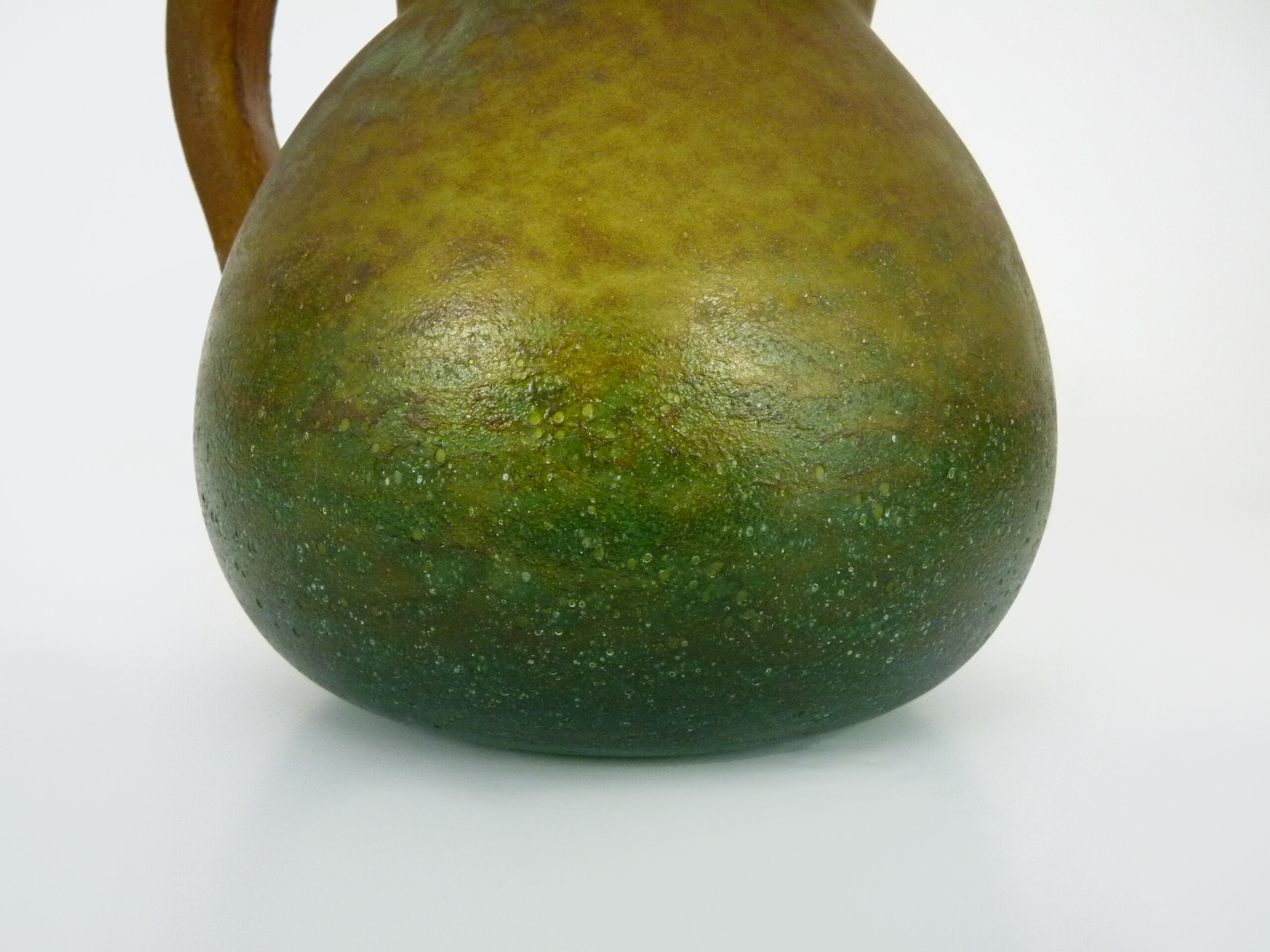 Pitcher in orange and green marble glass paste. Signed Georges De Feure for Daum