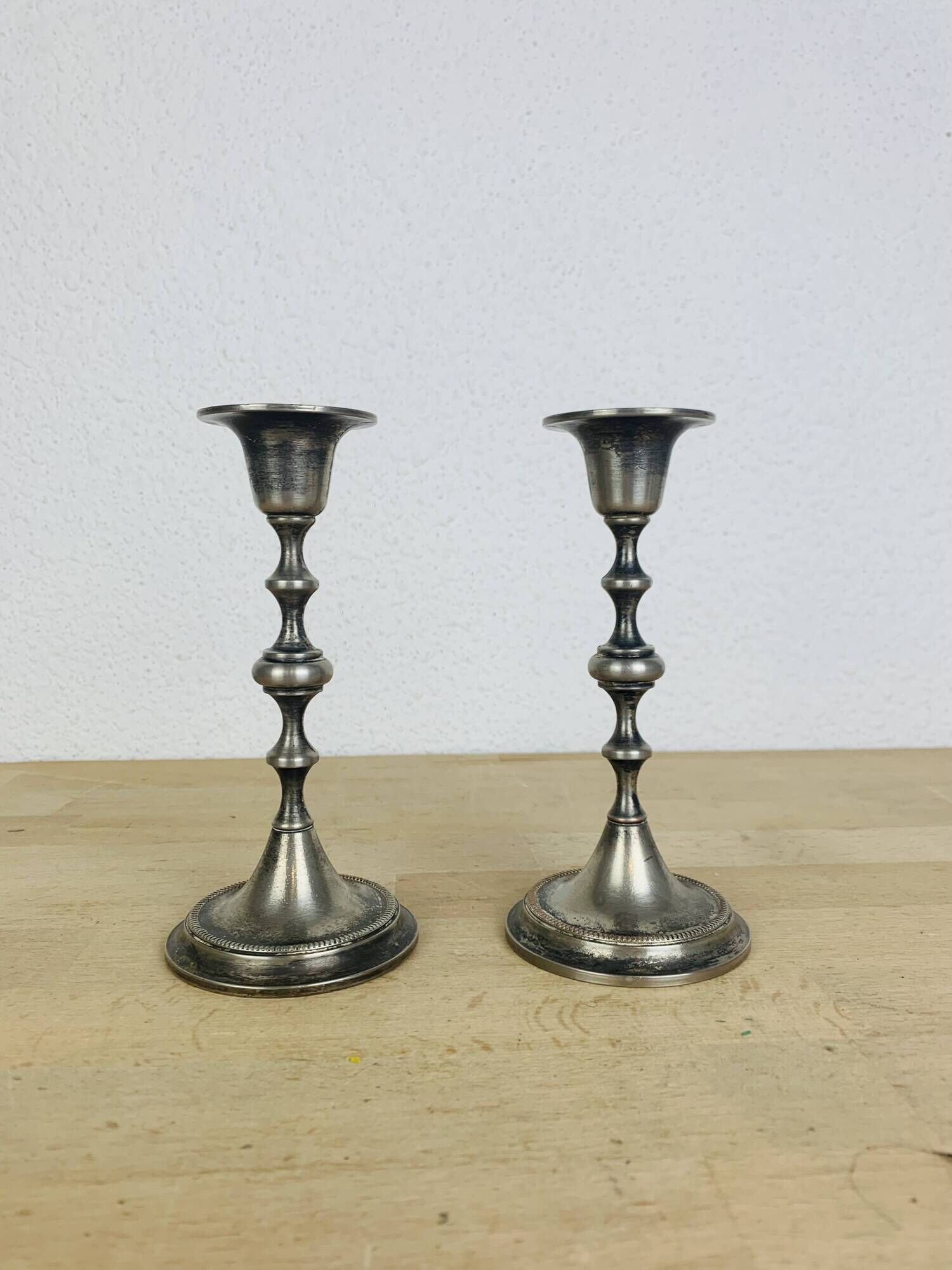Pair of vintage silver-plated metal candlesticks
