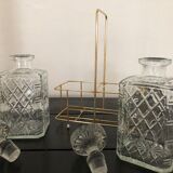 Pair of vintage decanters with brass basket