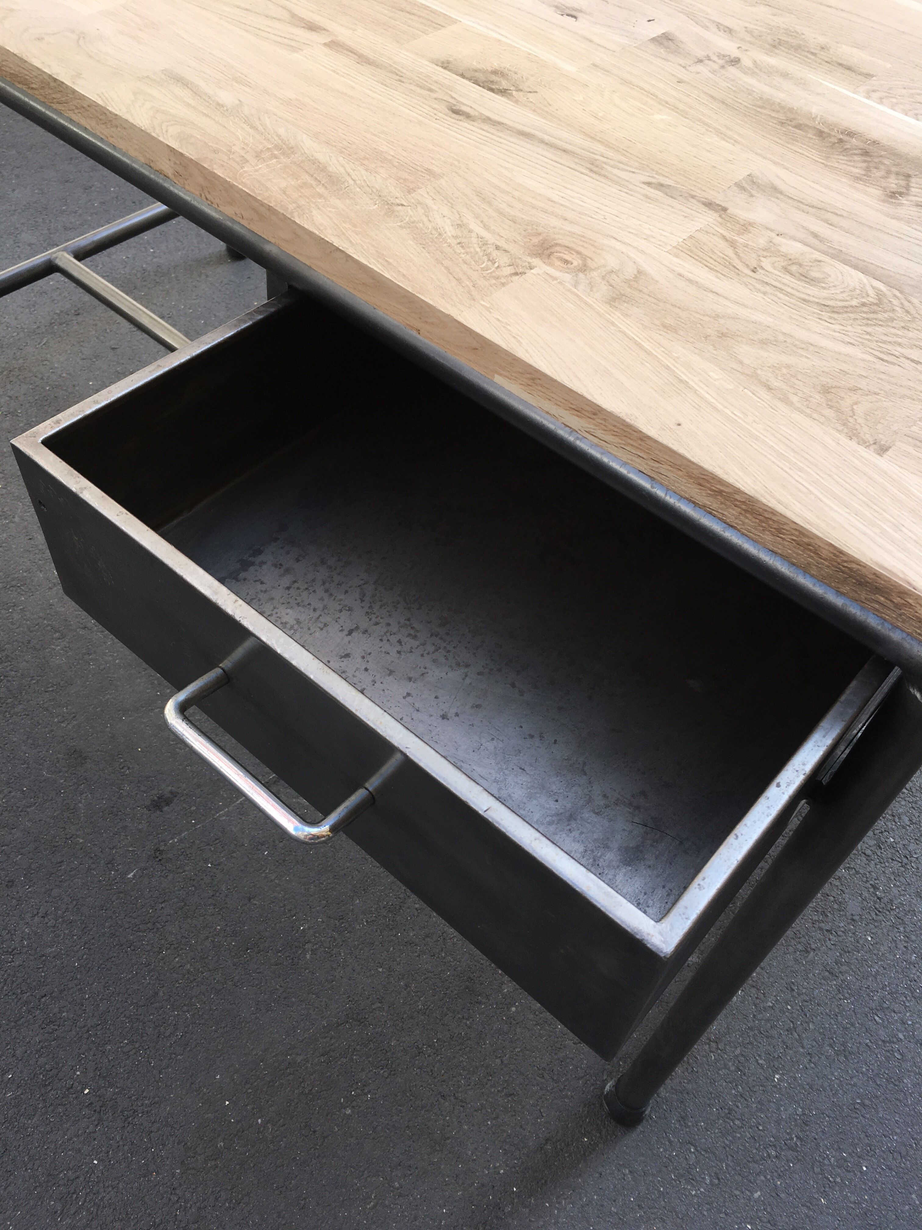 Metal desk on wood circa 1950