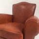 Large club chair in cognac leather