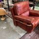 living room in patinated leather and brass from the 80s