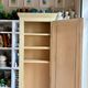 Standing man, cabinet with 1 door, 3 shelves in beige wood