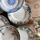 Set of 8 mismatched antique ironstone deep plates.
