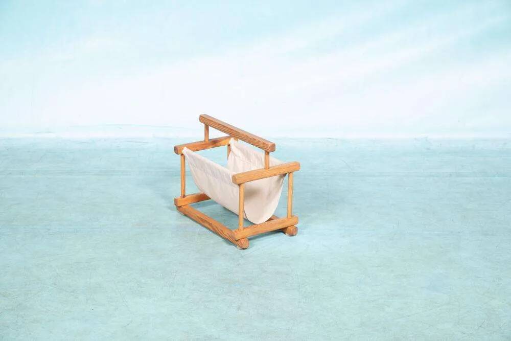 Bohemian magazine rack in vintage 70s pine style.