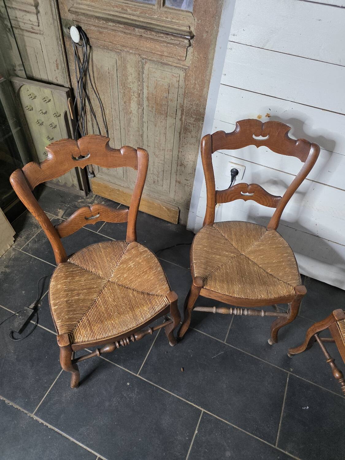 4 old straw chairs