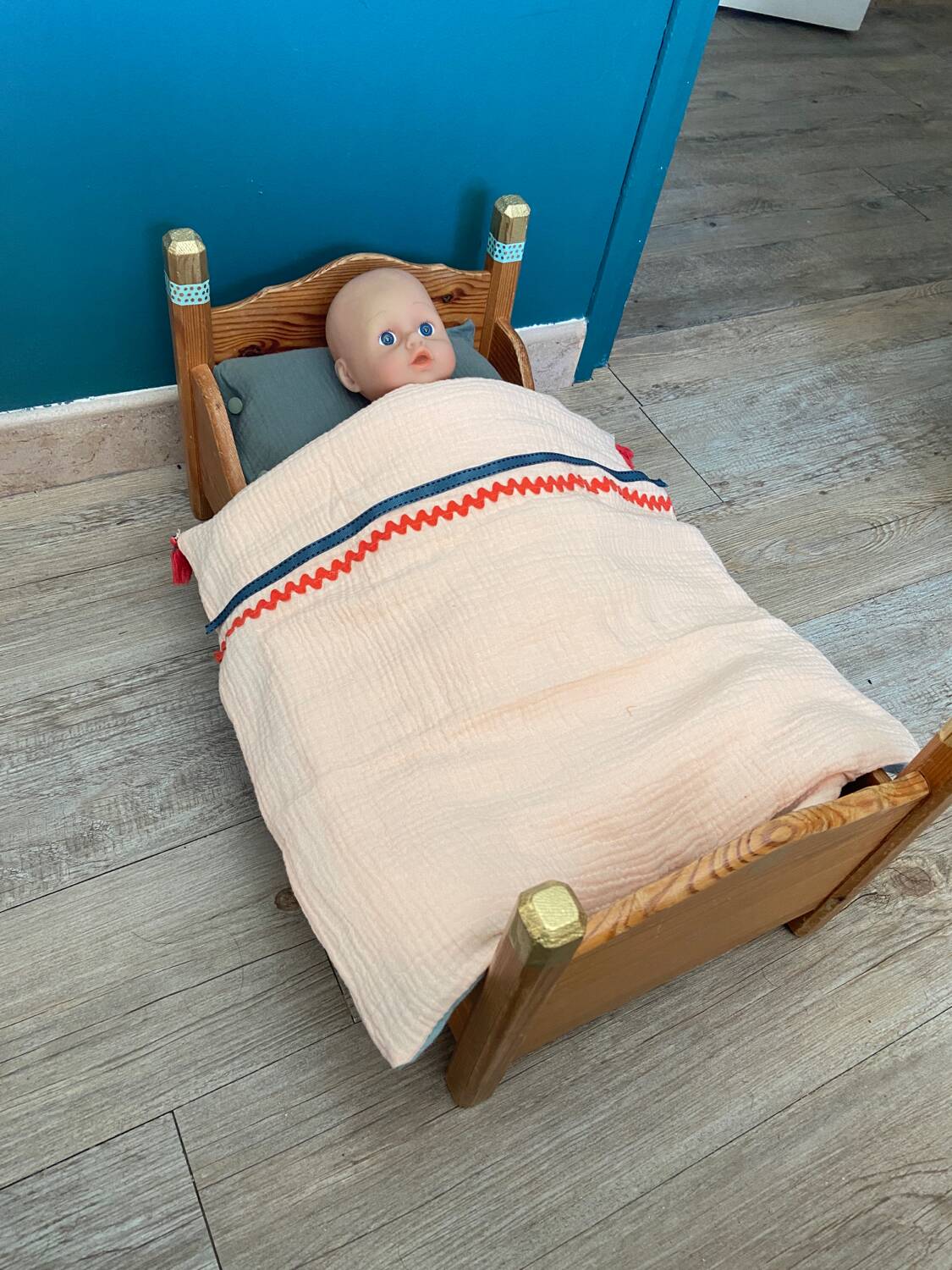 Wooden doll bed