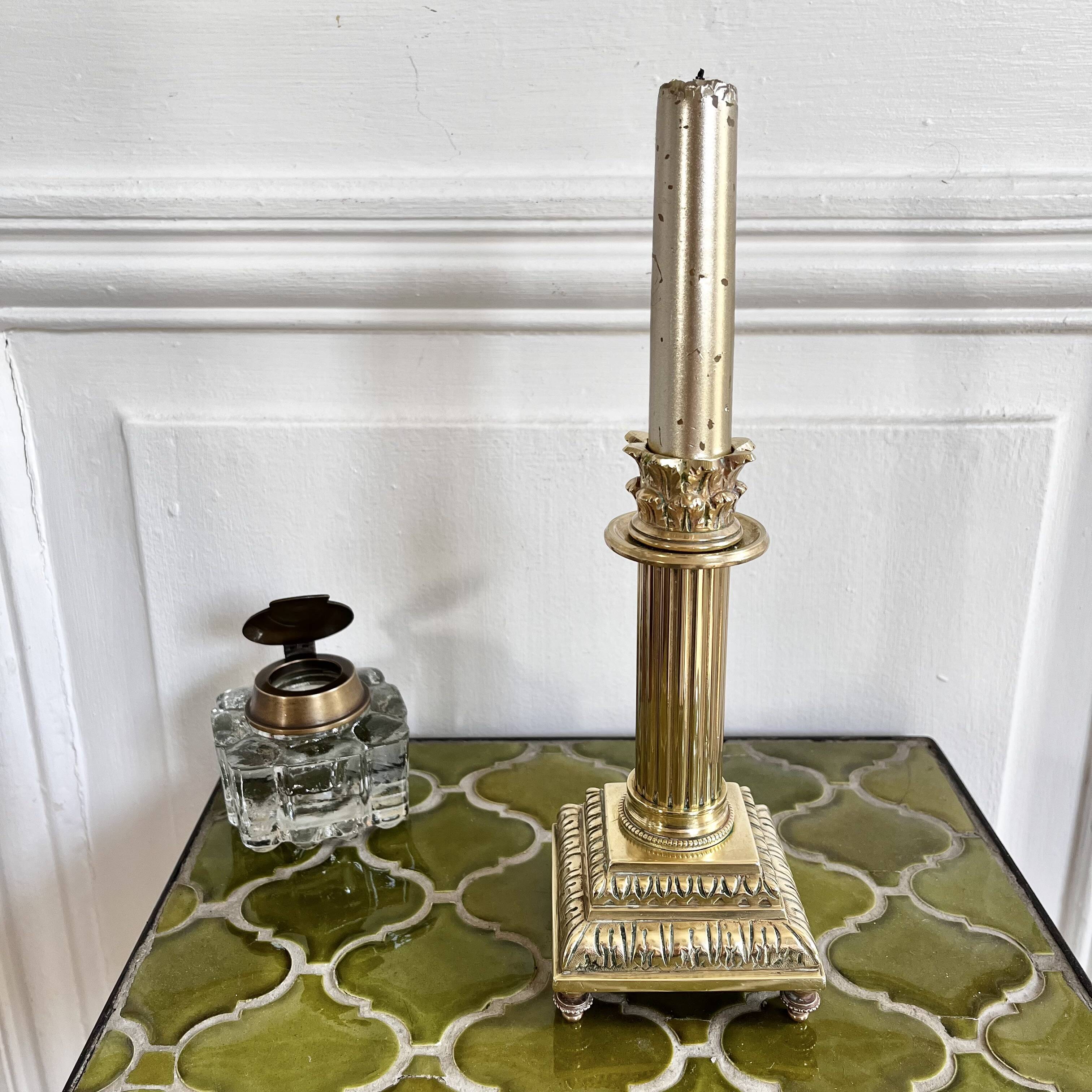 Empire style gold candle holder