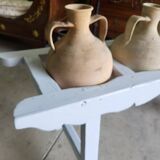 Antique painted wooden jar holder with 4 earthenware jars