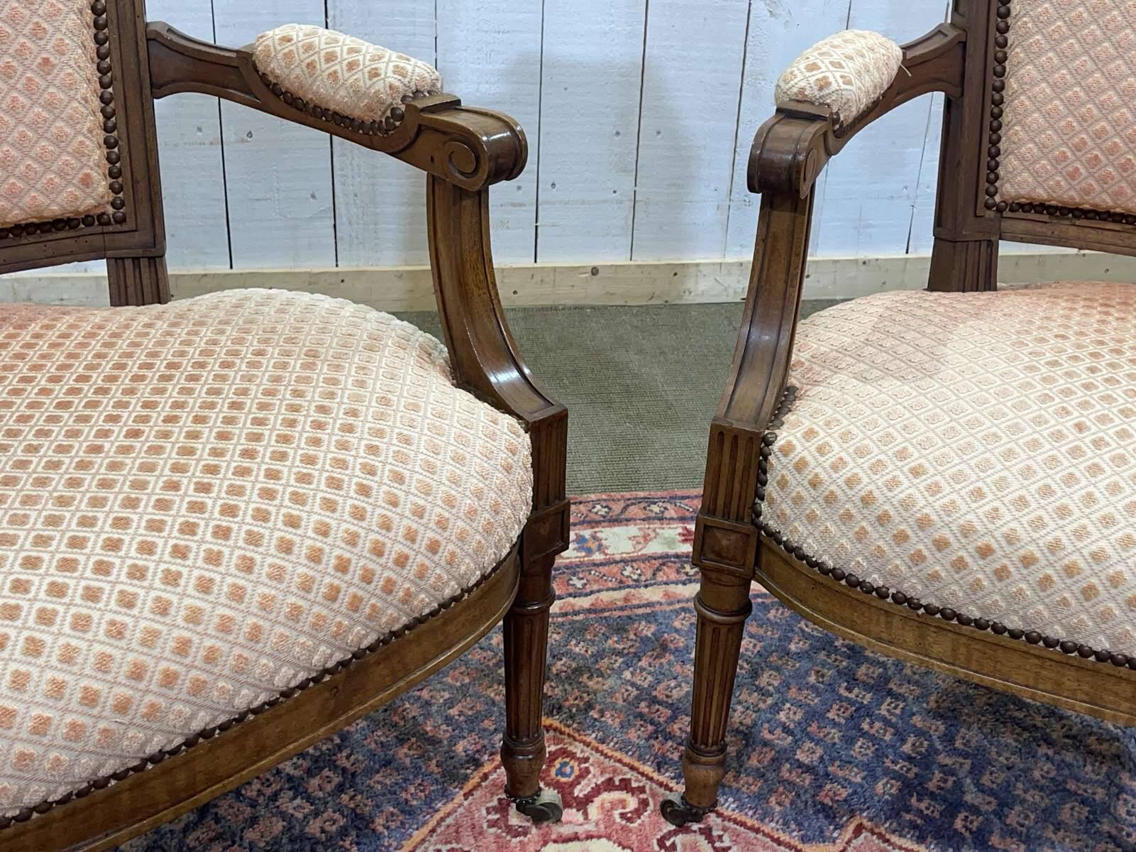 Pair of early 20th century Louis XVI armchairs in walnut
