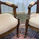 Pair of early 20th century Louis XVI armchairs in walnut