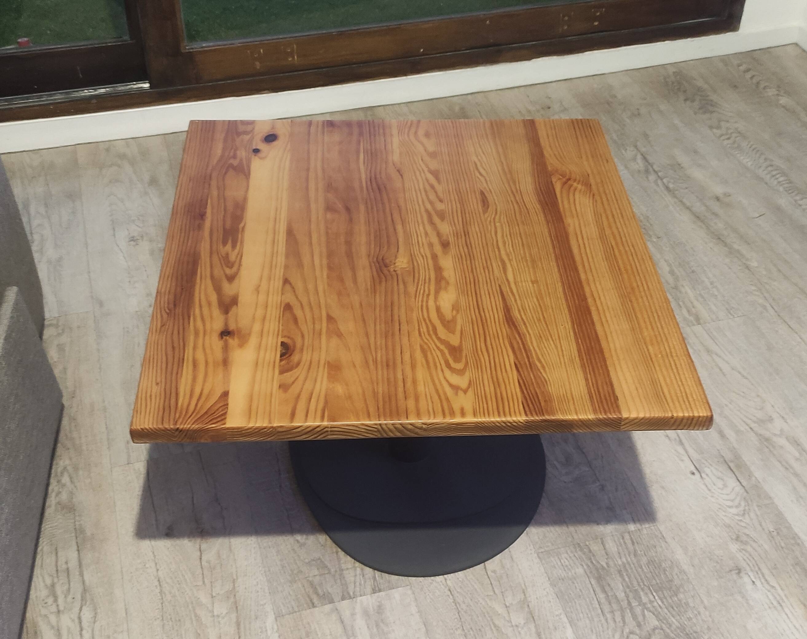 Solid wood coffee table in industrial style