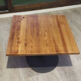 Solid wood coffee table in industrial style