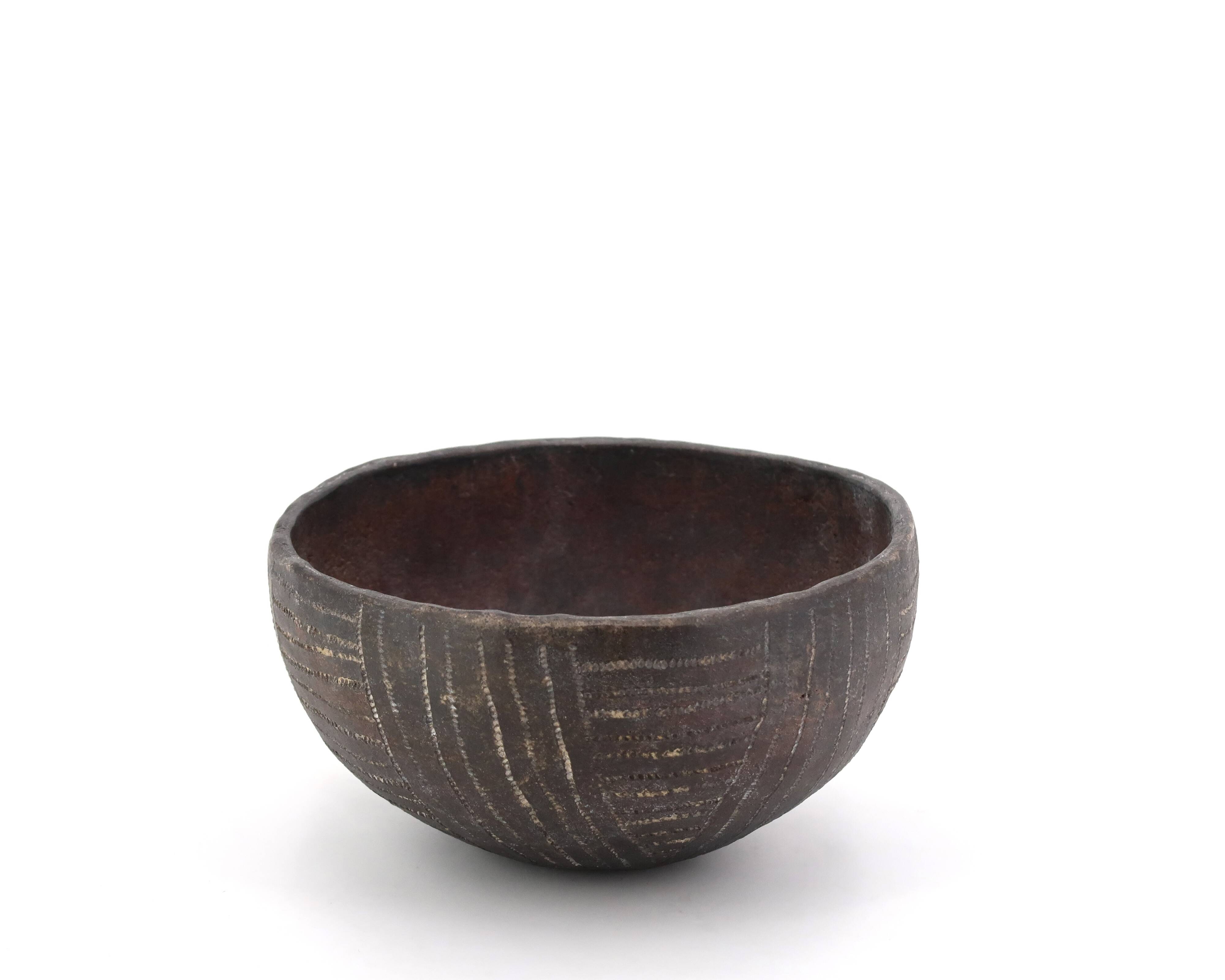 Empty tumbler pocket in ceramic by Brigitte Marionneau