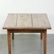 Antique pinewood coffee table with a drawer and a rural appearance