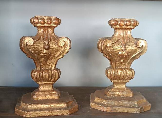 An antique pair of Louis XIV style paddle holders.