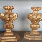 An antique pair of Louis XIV style paddle holders.
