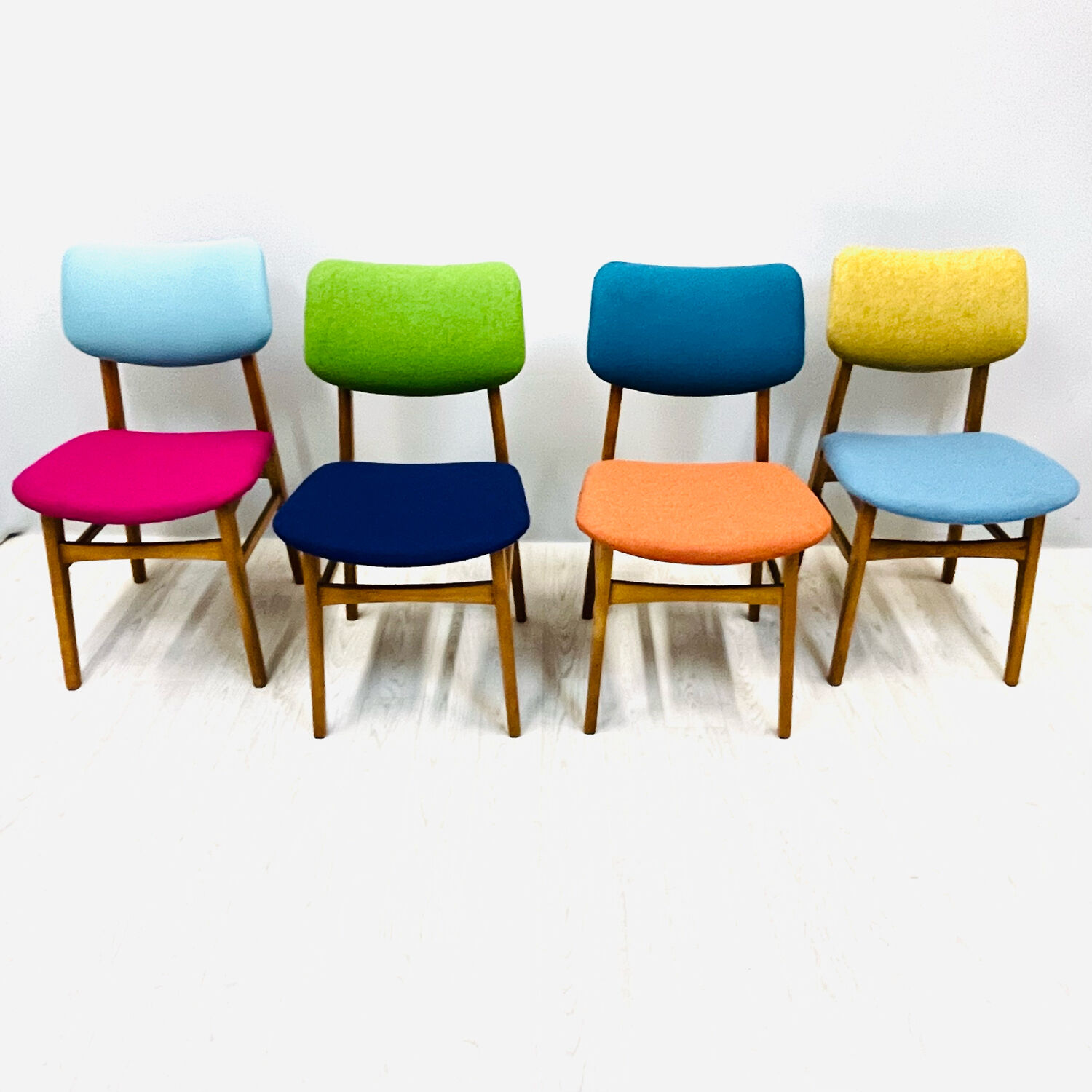 Four middle century chairs