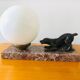 Lampe Art déco globe en opaline blanche et chien de chasse