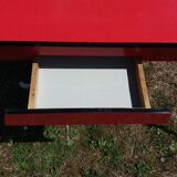 Dining table with red formica extensions