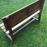 Wooden bench with back