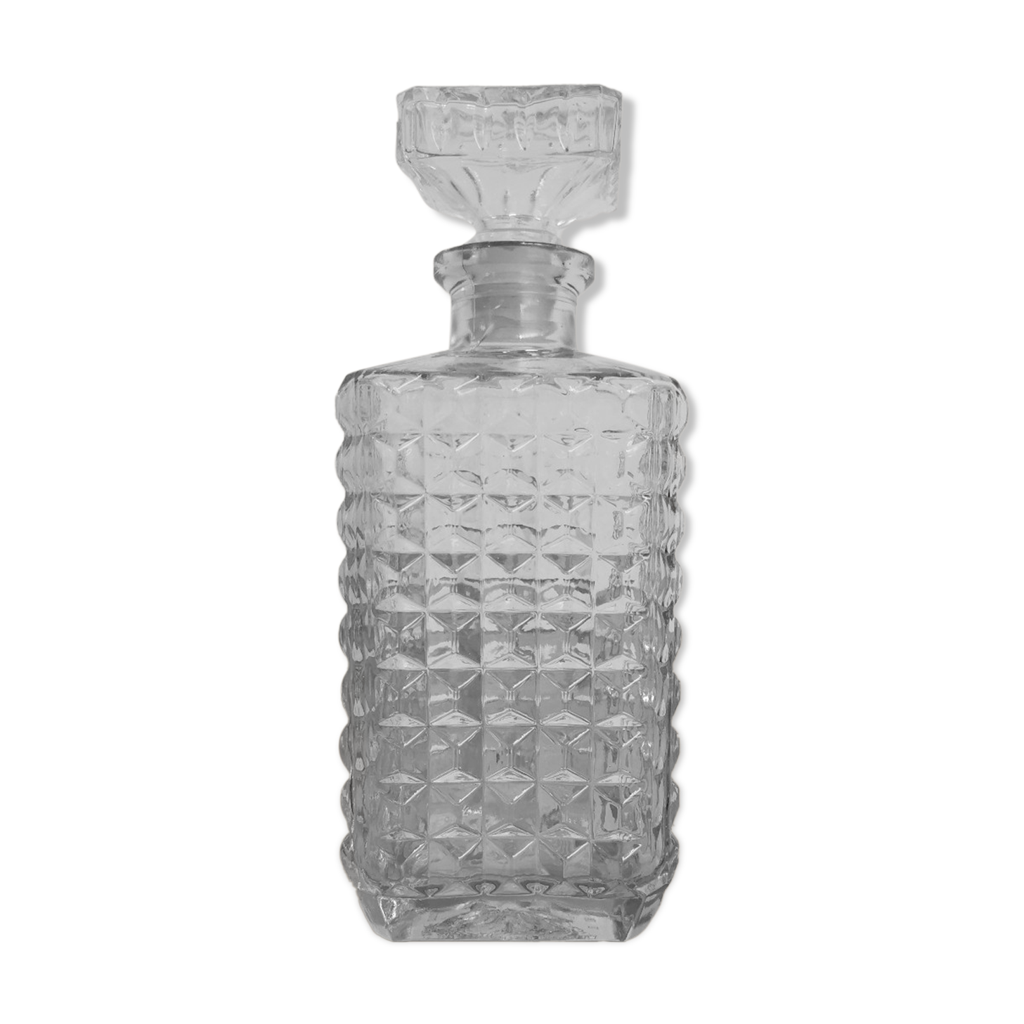 Carved old whisky decanter