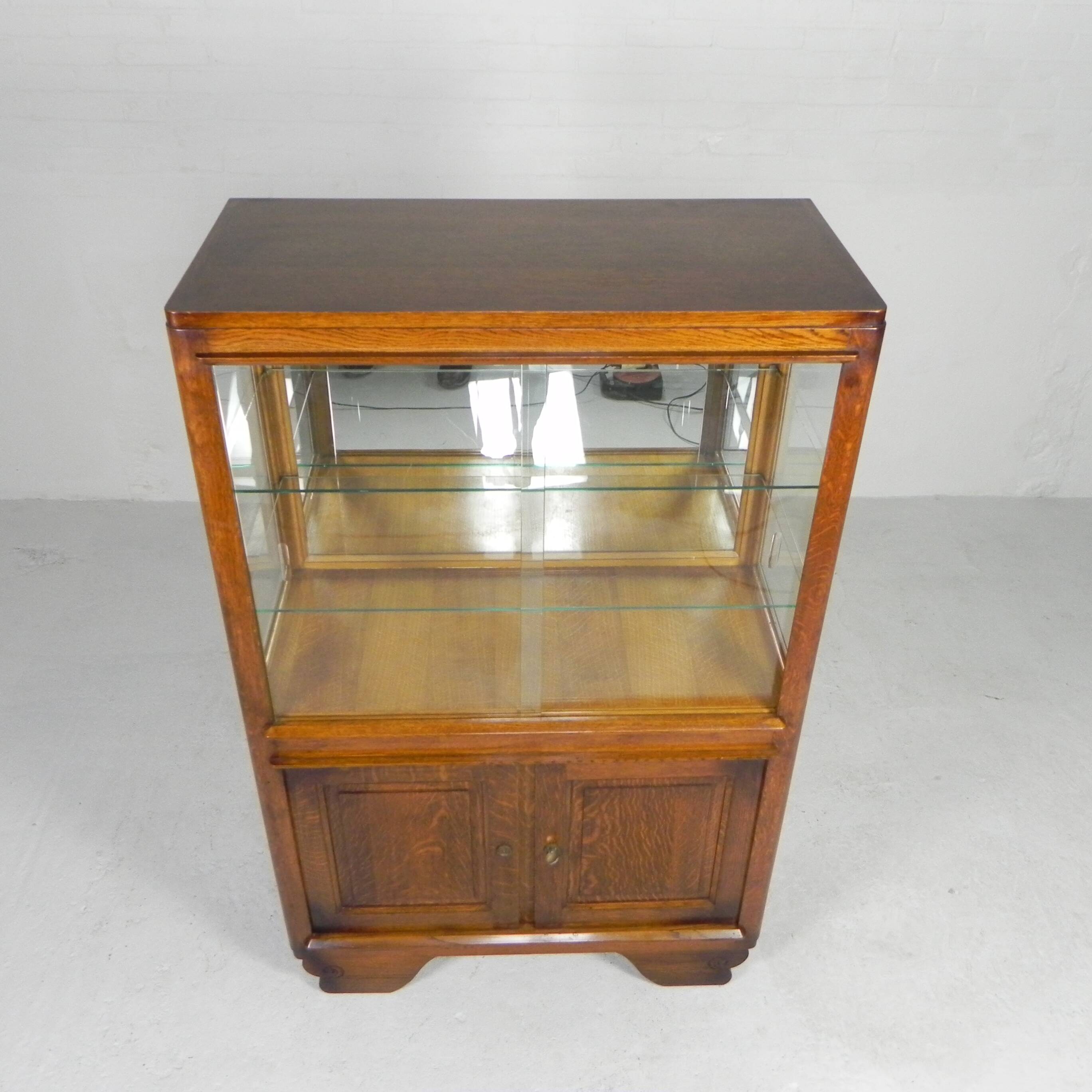 Art Deco display cabinet with sliding glass doors