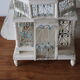 Vintage white and blue birdcage