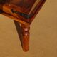 Solid wood and wrought iron table